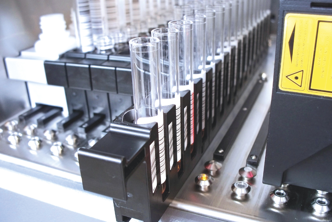 Close-up of the testing rack in the GEMINI processor for ELISA testing by Diatron Close-up of the testing rack in the GEMINI processor for ELISA testing by Diatron