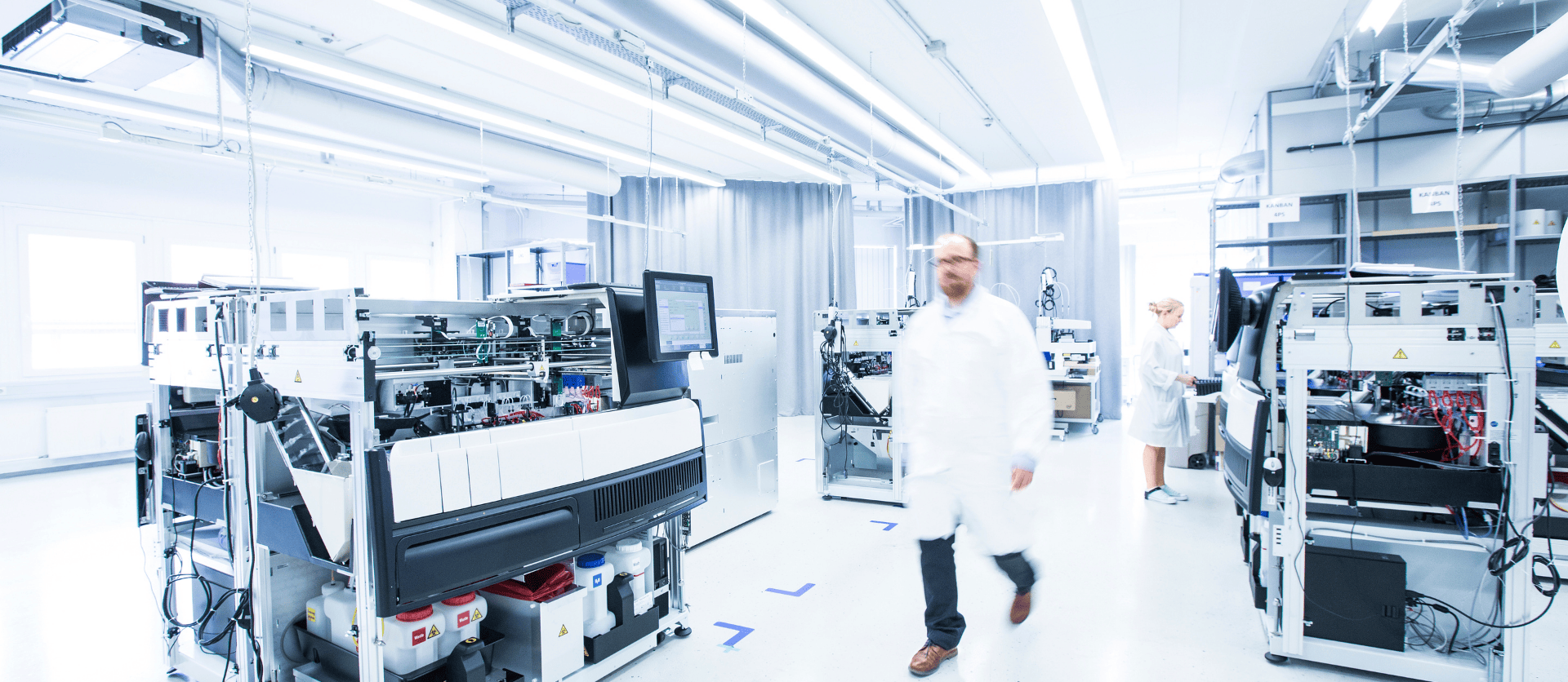 Two laboratorians in the final testing laboratory