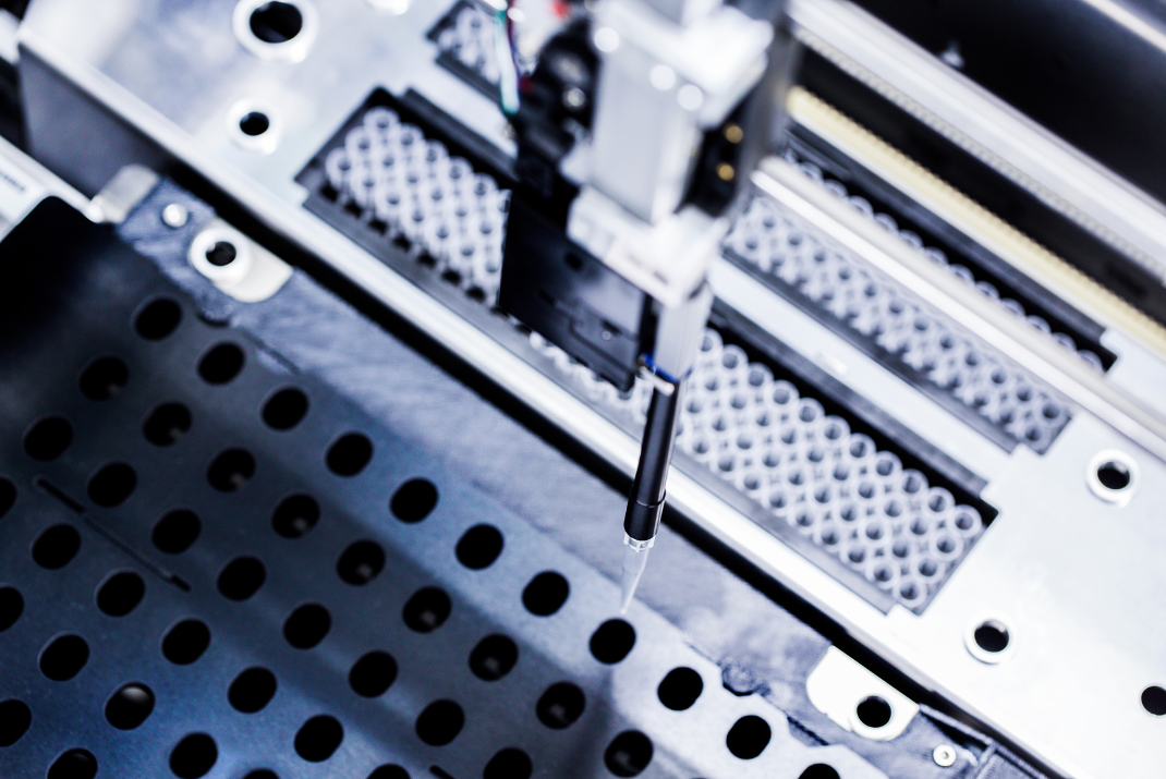 Close-up from the top of an analyzer system with STRATEC’s air displacement pipettor