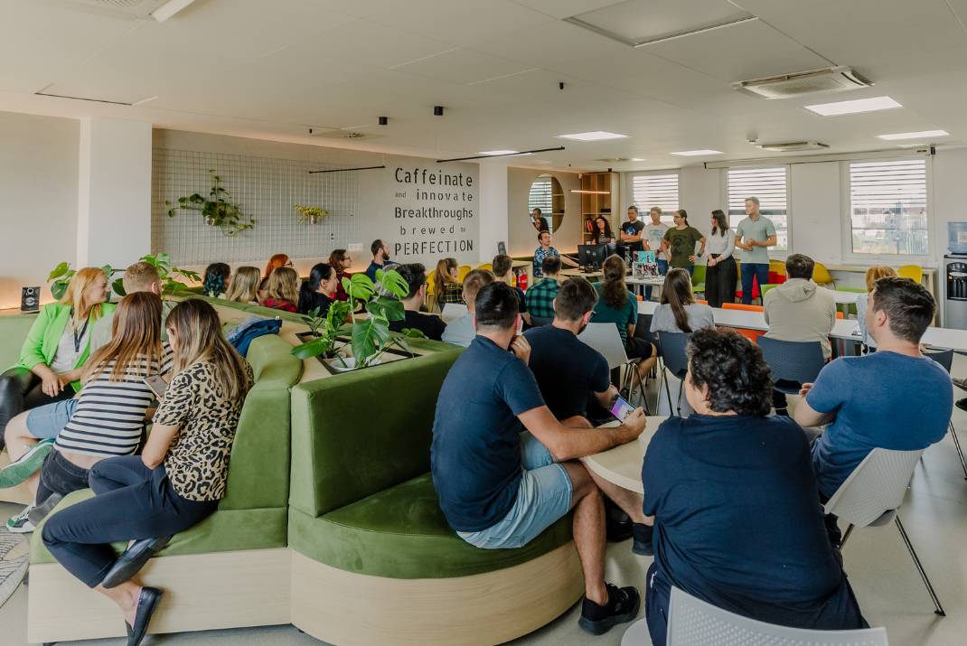 STRATEC employees in a corporate meeting in the lounge room in the Romanian STRATEC site